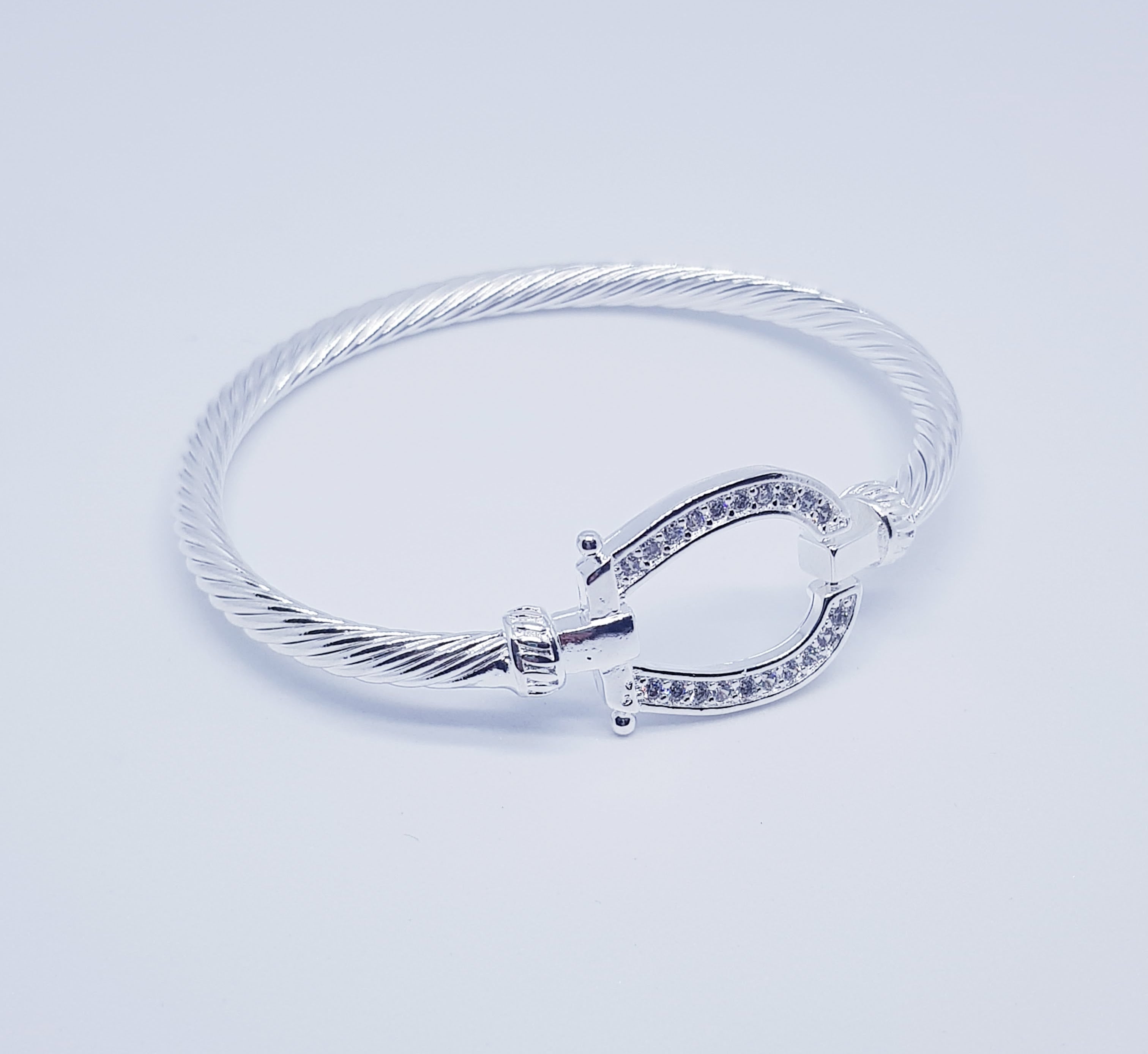 Silver crystal horse shoe bangle / bracelet